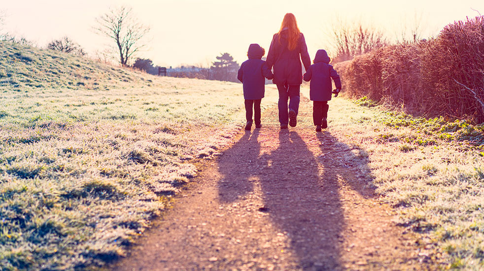 The Ramblers' Winter Walking Festival: mum and kids walking on a frosty day